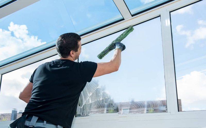 window cleaning professional cleaning window with squeegee
